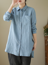 Camisa de manga larga, holgada, de largo medio, con botones y bolsillo